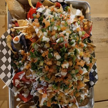 Mexhico - Top view of large nachos - Mexican Near Me - Barrie, Ontario Mexhico - Top view of large nachos - Mexican Near Me - Barrie, Ontario