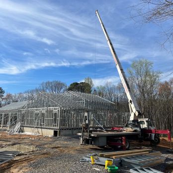 113 Contracting - a crane working on a house under construction - General Contractors Near Me 113 Contracting - a crane working on a house under construction - General Contractors Near Me