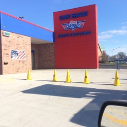 Patriot Car Wash - Their main sign that you can see from the road and my view waiting in line