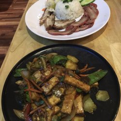 Mai Kitchen - Basil tofu stir fry and BBQ and crispy por rice dish