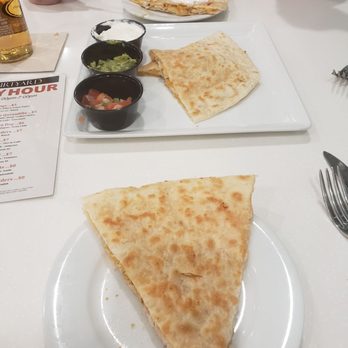 Courtyard Restaurant and Bar - The large portioned chicken quesadilla! - Salad Near Me - Anaheim, California Courtyard Restaurant and Bar - The large portioned chicken quesadilla! - Salad Near Me - Anaheim, California