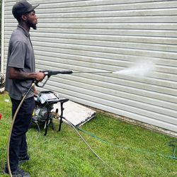 Davies Essential Services - Pressure washing siding