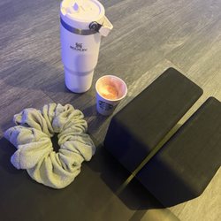Yoga mat, blocks, coffee, yoga mat, water bottle
