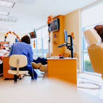 Zand Orthodontics - The area where patients sit, nice windows, nice TVs, nice chairs, warm colors - Orthodontists Near Me - Foothill Ranch, California Zand Orthodontics - The area where patients sit, nice windows, nice TVs, nice chairs, warm colors - Orthodontists Near Me - Foothill Ranch, California