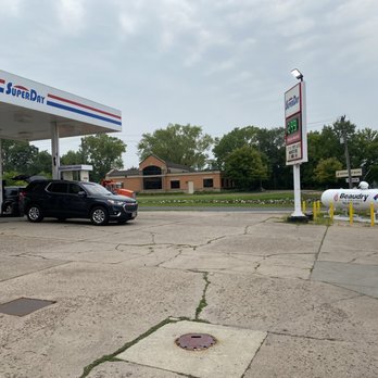 Sabrosos Taco - a car at a gas station - Tacos Near Me Sabrosos Taco - a car at a gas station - Tacos Near Me