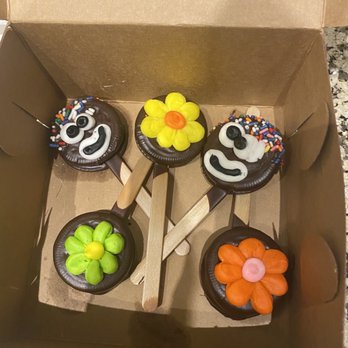 Masterpiece Cakeshop - Cholate covered, decorated Oreos on sticks. - Bakeries Near Me - Lakewood, Colorado