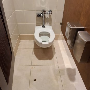 Hilton Bellevue - First floor women's restroom. Reported to hotel staff. 10 hours later feces is still there. - Hotels Near Me - Bellevue, Washington