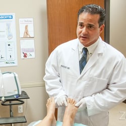 Absolute Foot Care Specialists - Dr. Levine caring for his patient