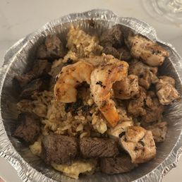 Grilled rice with shrimp, steak & chicken. Grilled rice with shrimp, steak & chicken.
