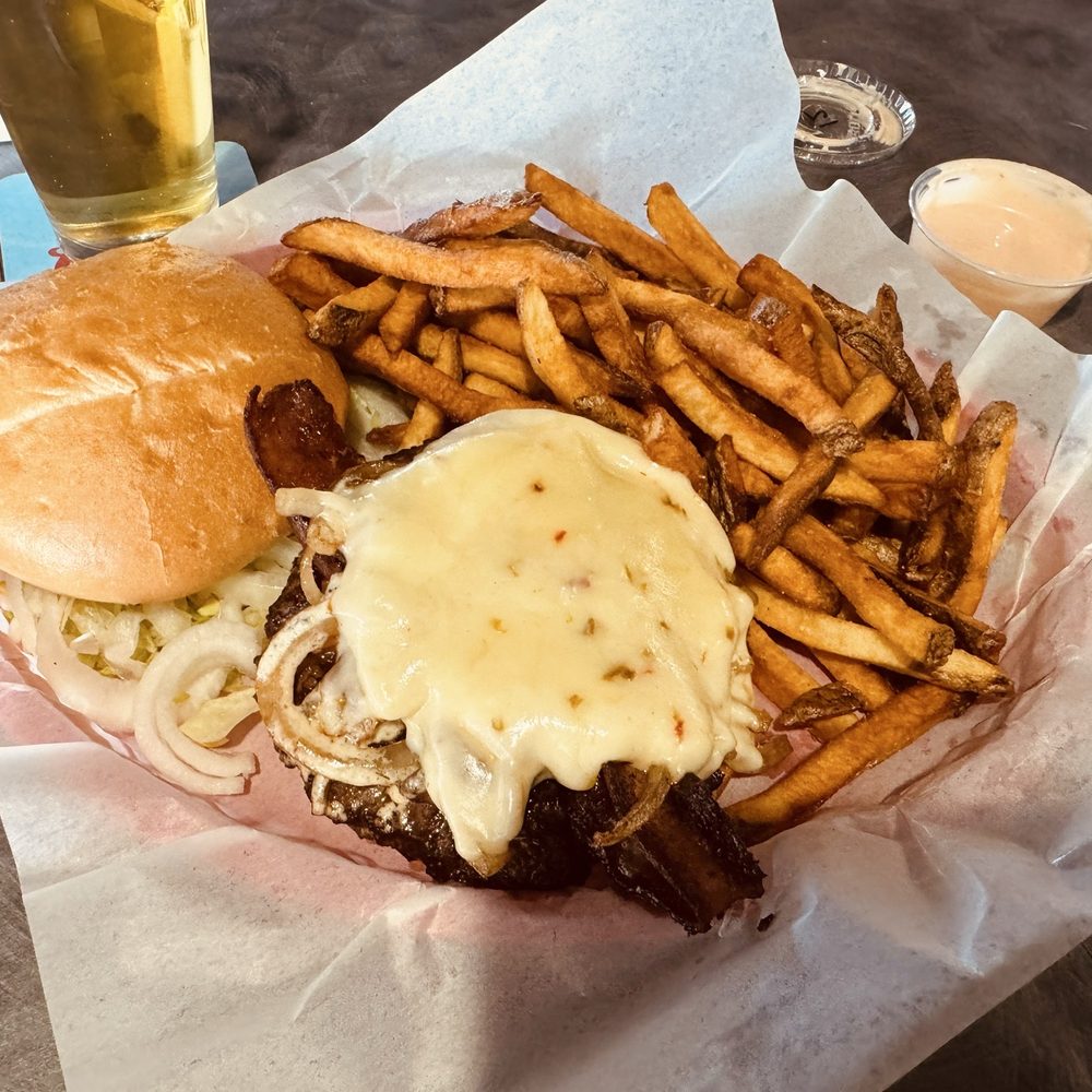 Fat Clarence's Pub and Grub - Maui Burger Special, Manly Bacon, Grilled Onions, Pepper Jack Cheese, Special Sauce & Extra Crispy Fries With Fries Sauce. - Bars Near Me - Jerome, Idaho