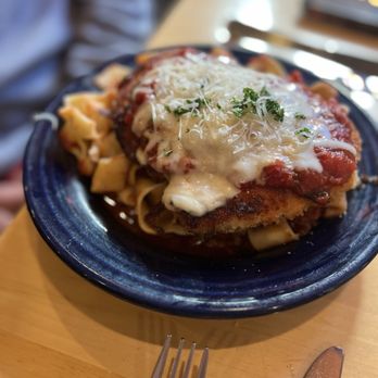 Ticino - Pappardelle with Bolognese sauce, topped with Chicken Parmesan. - Pizza Near Me - Avon, Colorado Ticino - Pappardelle with Bolognese sauce, topped with Chicken Parmesan. - Pizza Near Me - Avon, Colorado