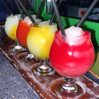 Tio Taco + Tequila Bar - Frozen margarita flight...much smaller than they appear! We got mango, strawberry, passion fruit, prickly pear - Mexican Near Me - Edison, New Jersey Tio Taco + Tequila Bar - Frozen margarita flight...much smaller than they appear! We got mango, strawberry, passion fruit, prickly pear - Mexican Near Me - Edison, New Jersey