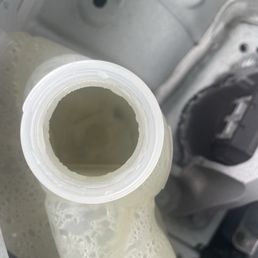 Empty coolant container Empty coolant container