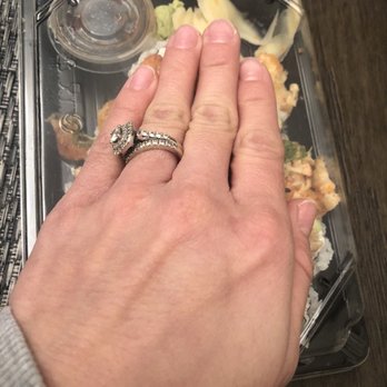 Daru Sushi - My hand is over it almost covering the size of the roll. Very tiny compared to how Daru would make their rolls before. - Sushi Bars Near Me - Bellflower, California