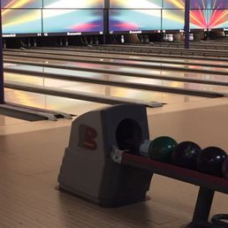 a bowling alley with bowling balls