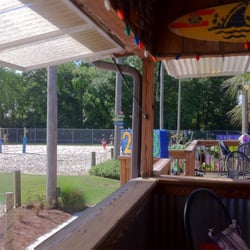 Mango's Outdoor Volleyball Complex - Looking outside from the bar area. This place is awesome!