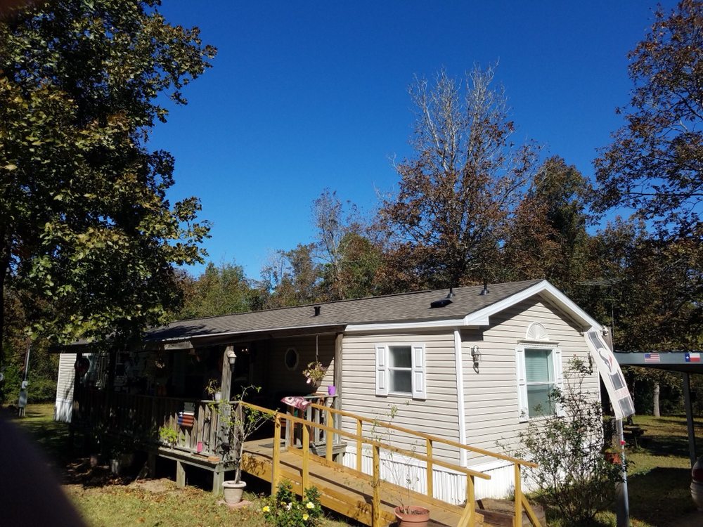 Slide of ShingleMasters Roofing