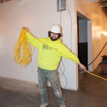 Alternative Edge Concrete - a man in a hard hat holding a rope - Masonry/Concrete Near Me - Damascus, Oregon Alternative Edge Concrete - a man in a hard hat holding a rope - Masonry/Concrete Near Me - Damascus, Oregon