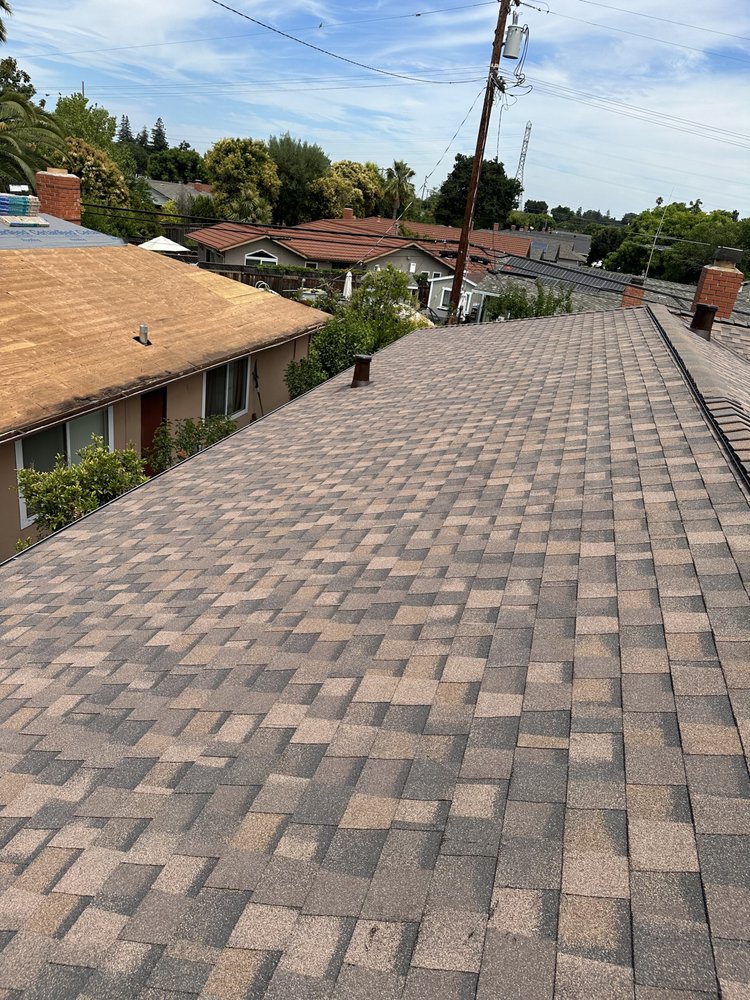 Slide of G West Roofing