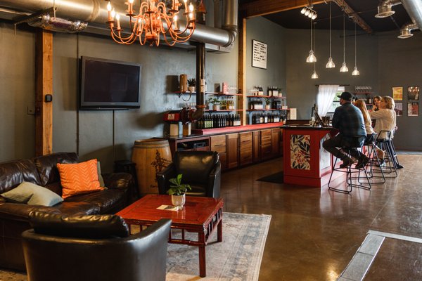 Photo of Covington Cellars - Woodinville, WA, US. a man and a woman in a bar