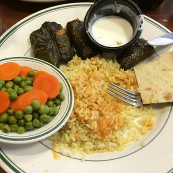 Red Olive - Grape leaves dinner with rice pilaf and vegetable of the day. This picture was taken after I took a few bites. - Mediterranean Near Me - Hartland, Michigan