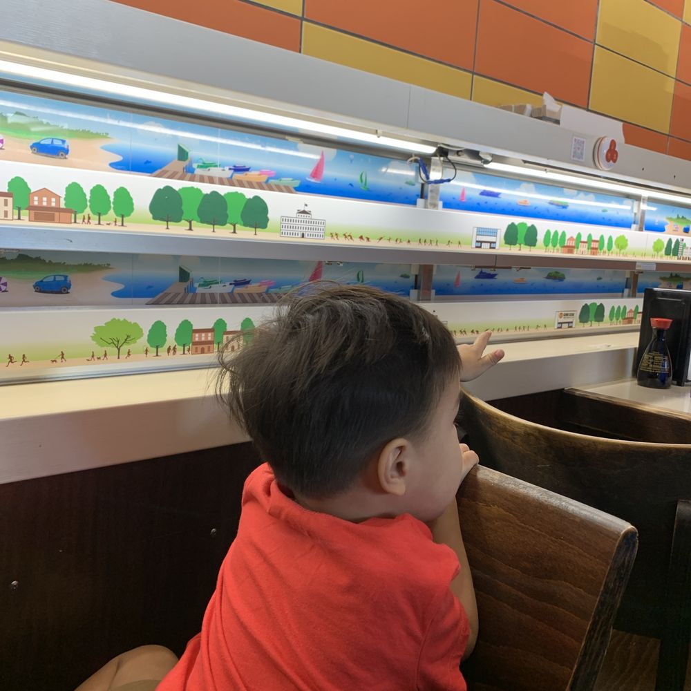Genki Sushi - Son-son waiting for our sushi - Sushi Bars Near Me - Honolulu, Hawaii Genki Sushi - Son-son waiting for our sushi - Sushi Bars Near Me - Honolulu, Hawaii