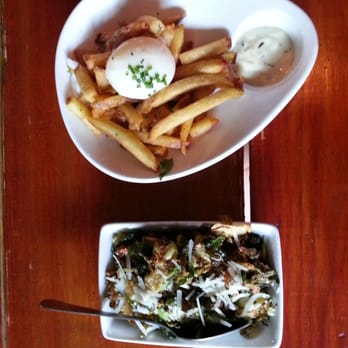 Salty Sow - Duck fat fries and crispy brussells sprout leaves - American Near Me - Austin, Texas Salty Sow - Duck fat fries and crispy brussells sprout leaves - American Near Me - Austin, Texas