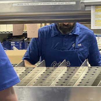 Culver's - Maskless man handling food - Burgers Near Me - Harwood Heights, Illinois