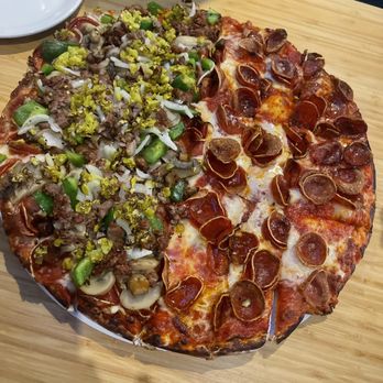 Emelio's - Great pizza!  Pic is half pepperoni and half all the way.  We also love their special salad, so yummy! - Pizza Near Me - Columbus, Ohio