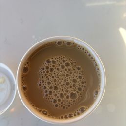 Medium roast drip coffee with cream Medium roast drip coffee with cream