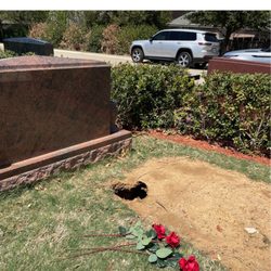 Moore Funeral Home & Memorial Gardens - Sink hole and no grass.