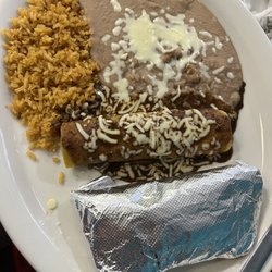 Enchilada, taco (in foil), rice and beans