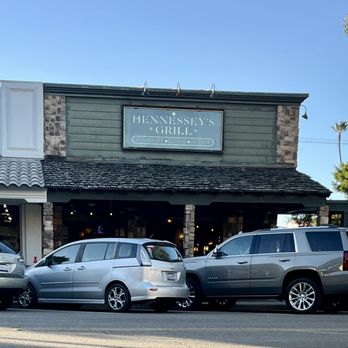 Hennessey's Grill - cars parked in front of the restaurant - Juice Bars & Smoothies Near Me - Seal Beach, California
