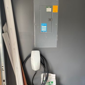 Winn Electric Contracting - flush mounted tesla charger next to the breaker panel. - Electricians Near Me - Timonium, Maryland Winn Electric Contracting - flush mounted tesla charger next to the breaker panel. - Electricians Near Me - Timonium, Maryland