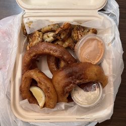 Woody's Seafood Saloon - Blackened shrimp (7) with onion rings