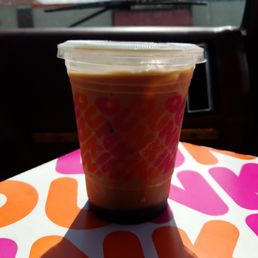 a cup of coffee on a table a cup of coffee on a table