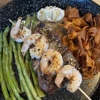 The Mailroom - Partials ribeye and shrimp - Cocktail Bars Near Me - Clarksville, Tennessee The Mailroom - Partials ribeye and shrimp - Cocktail Bars Near Me - Clarksville, Tennessee