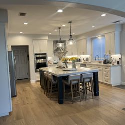 Lighthouse General Contracting - Beautiful kitchen remodel in northern California: Quartzite counters and splash, upgraded lighting and appliances, gorgeous wood flooring