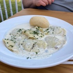 CJ’s Surf and Turf - Mushroom Ravioli appetizer
