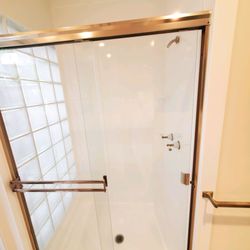 All Refinishing - Installed sliding shower door.