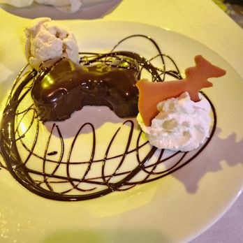 Yellow Dog Cafe - Chocolate brownie with ice cream - Seafood Near Me - Malabar, Florida Yellow Dog Cafe - Chocolate brownie with ice cream - Seafood Near Me - Malabar, Florida