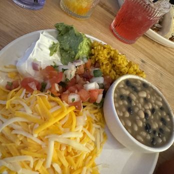Zef’s Streetside Social - Rice, beans, cheese, sour cream and guacamole that came with the Fajita dish - Mexican Near Me - Macomb, Michigan