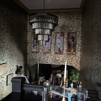 Broken Spirits-Anaheim - View of the landing of the stairs from the second floor - Cocktail Bars Near Me - Anaheim, California Broken Spirits-Anaheim - View of the landing of the stairs from the second floor - Cocktail Bars Near Me - Anaheim, California