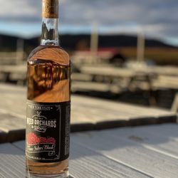 Weed Orchards and Winery - Three Sisters Blush wine and outdoor seating