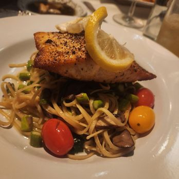 Trevioli Italian Kitchen at the Rapids - Garlic and oil pasta with seasonal vegetable and salmon add on. - Italian Near Me - Columbus, Georgia Trevioli Italian Kitchen at the Rapids - Garlic and oil pasta with seasonal vegetable and salmon add on. - Italian Near Me - Columbus, Georgia