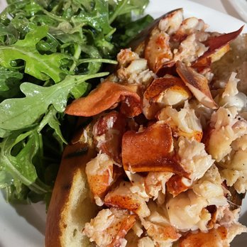 Neptune Oyster - Hot buttered lobster roll with arugula. - Seafood Near Me - Boston, Massachusetts Neptune Oyster - Hot buttered lobster roll with arugula. - Seafood Near Me - Boston, Massachusetts