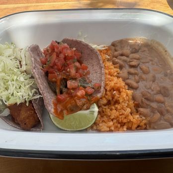 NIDO's BackYard - Me and my coworker got fish taco plate and carne asada to share one of each , very good - Mexican Near Me - Oakland, California
