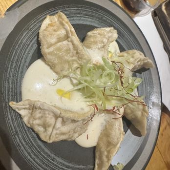 Nomé Izakaya - Gyoza with truffle sauce - Lounges Near Me - Toronto, Ontario Nomé Izakaya - Gyoza with truffle sauce - Lounges Near Me - Toronto, Ontario