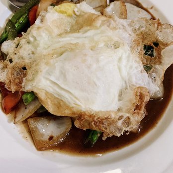 Moo Dang - Garlic and pepper with two fried eggs - Thai Near Me - Reno, Nevada