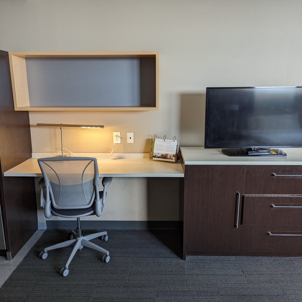 Home2 Suites by Hilton Florence, SC - This is a view of the desk and TV in room 422. Photo taken August 27, 2022. - Hotels Near Me - Florence, South Carolina Home2 Suites by Hilton Florence, SC - This is a view of the desk and TV in room 422. Photo taken August 27, 2022. - Hotels Near Me - Florence, South Carolina